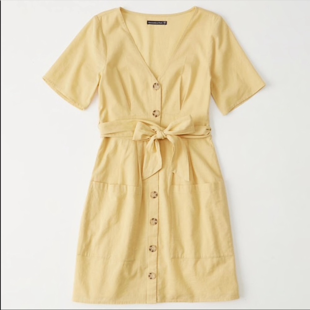 Cute light creamy yellow button down dress